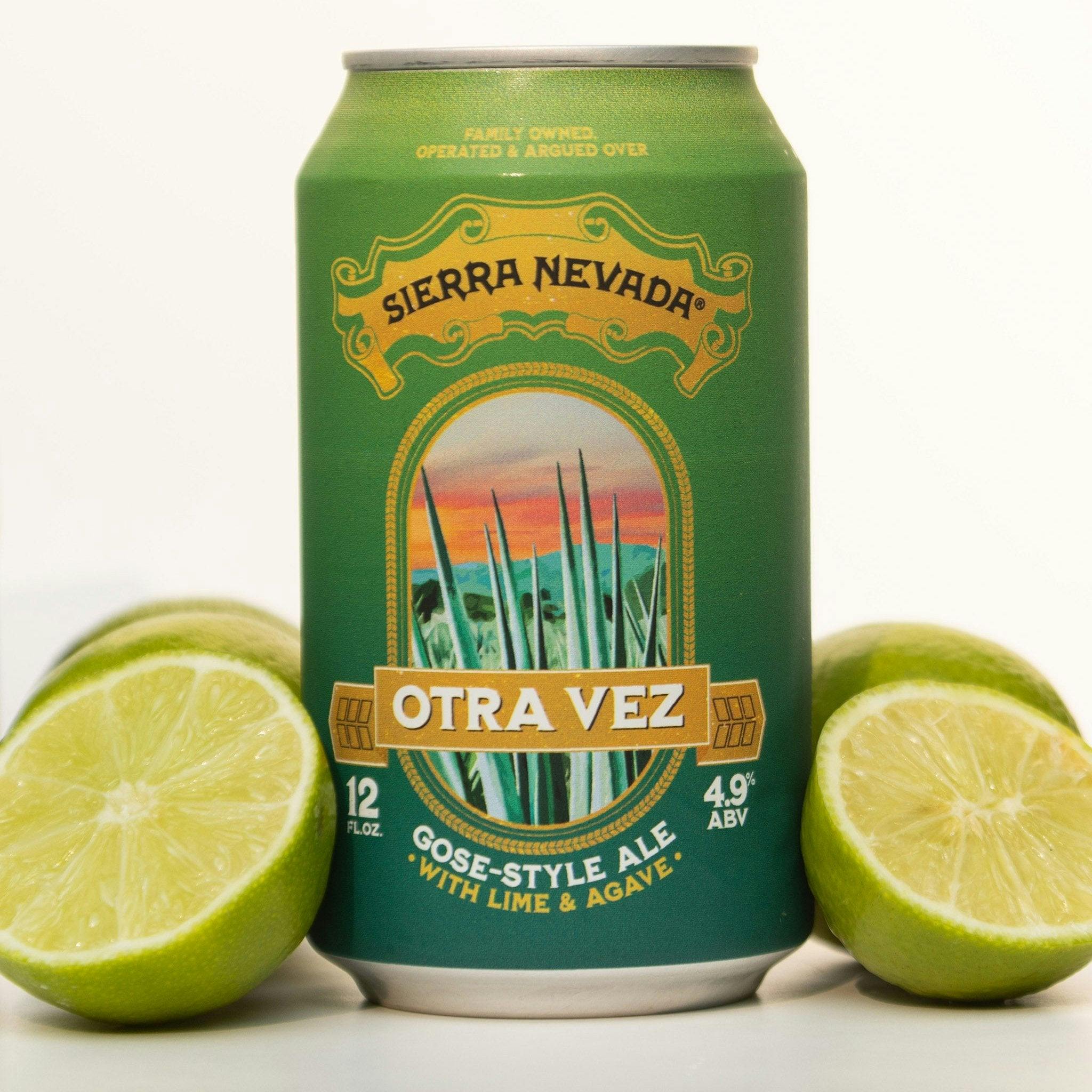 Otra Vez 12oz. can with freshly sliced limes