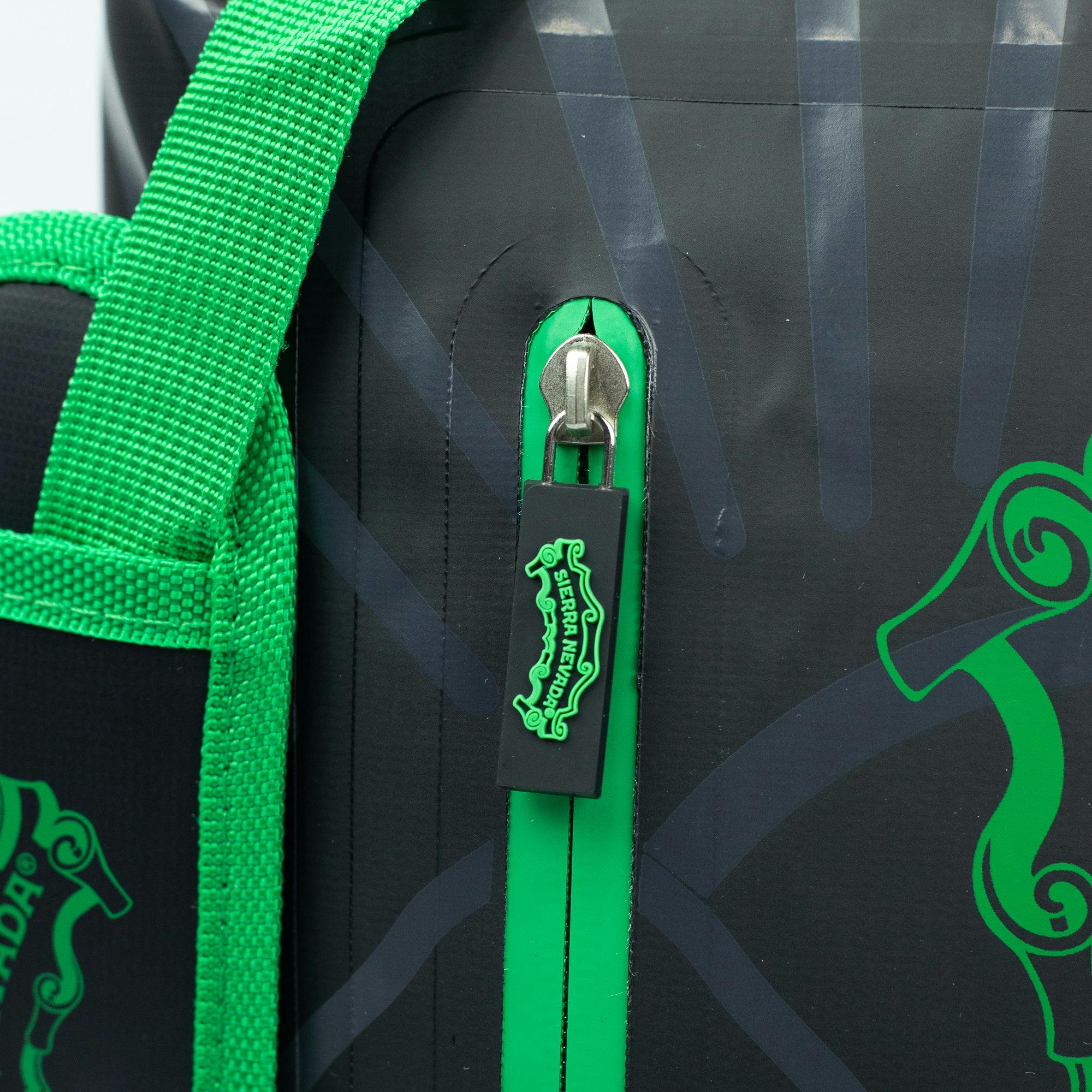 Sierra Nevada Dry Bag - up close view of the rubberized zipper pull featuring the Sierra scroll logo