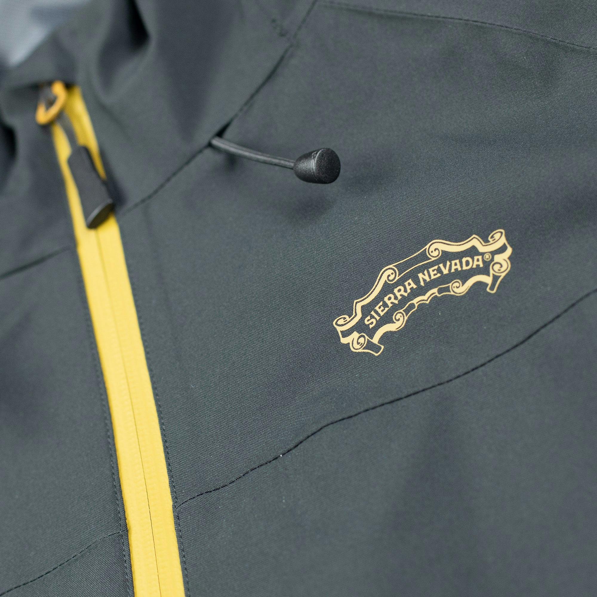 Sierra Nevada Women's Rain Jacket - detail shot of Sierra logo scroll on the chest